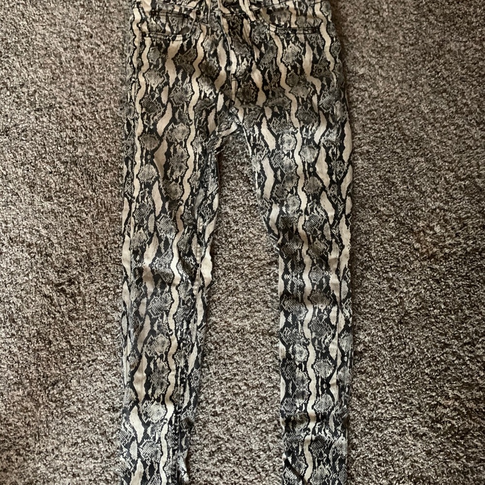 Snakeskin skinny jeans